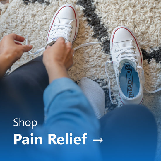 A person tying their shoes with a blue Pace insole visible.