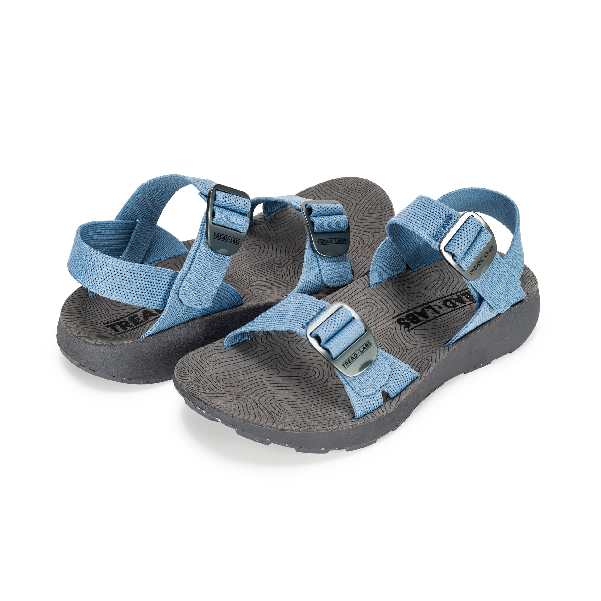 Pair of Women's Salinas Sandals in Sky on a white background.
