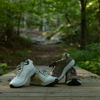 trail shoes on a wooden bridge