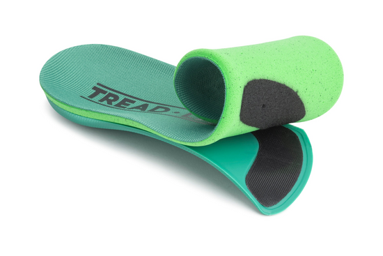 Ramble Insoles with the removable top cover being peeled back from the hard plastic arch support.