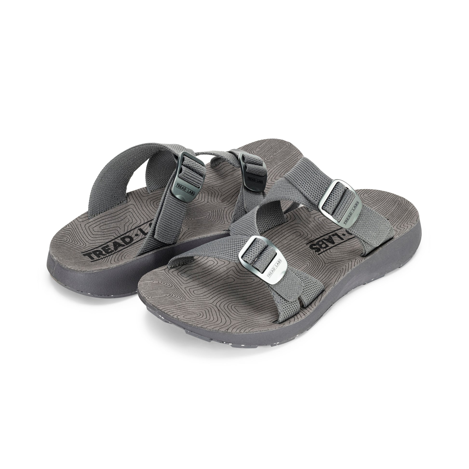 Pair of Men's Redway Slide Sandals in Rock gray on a white background.