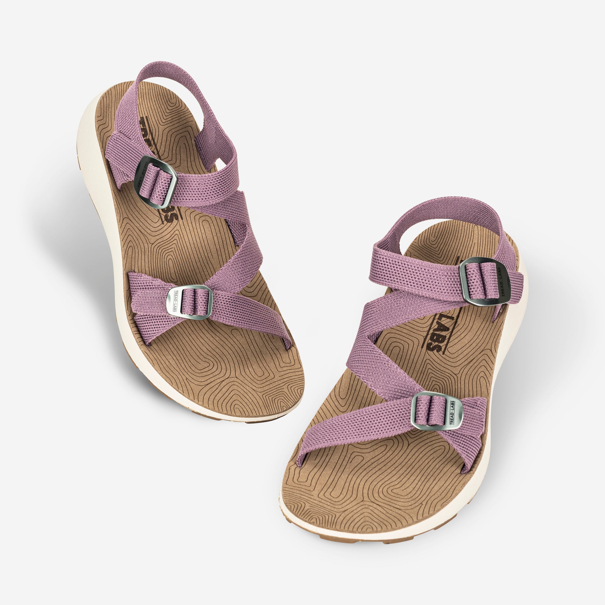 Pair of Women's Redway Sandals in lilac on a light gray background.